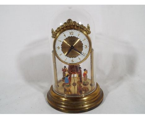 A German dome mantel clock with wind up movement, 16cm (h)