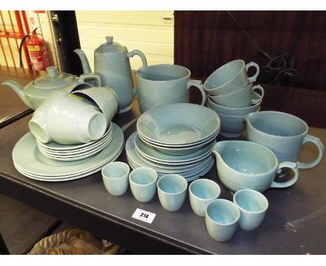 A Wood's Ware Beryl part tea service consisting of approx 35 pieces to include a tea pot, coffee pot, milk jug, cups and sauc