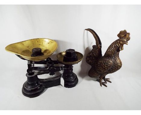 A heavy brass ornament in the form of a cockerel and a set of vintage weighing scales (2) 