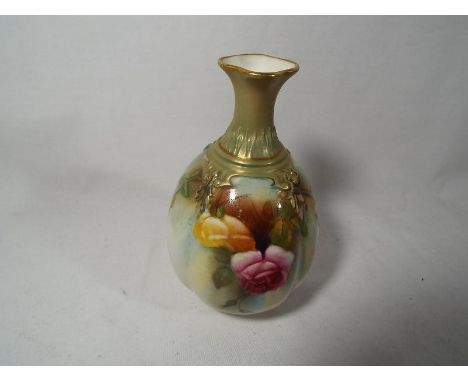 A Royal Worcester small bulbous vase decorated with roses on a cream ground 10.5cm (h) Est £40 - £60