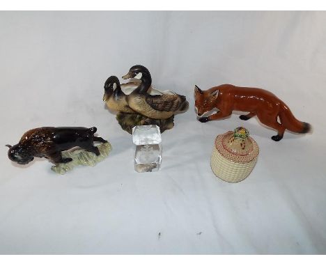 A collection of ceramic figurines to include a ceramic poesy vase in the form of Canadian geese, Geobel figurine in the form 