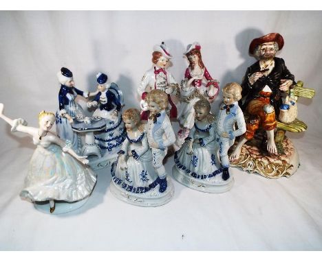 Seven ceramic figurines to include Capodimonte, Leonardo and others - (7)