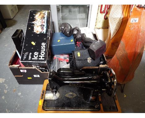 A mixed lot to include cameras, mobile phone, Bohemia glasses, a light up Christmas ice house, included in the lot a vintage 
