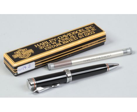 A boxed Harley Davidson ballpoint pen.