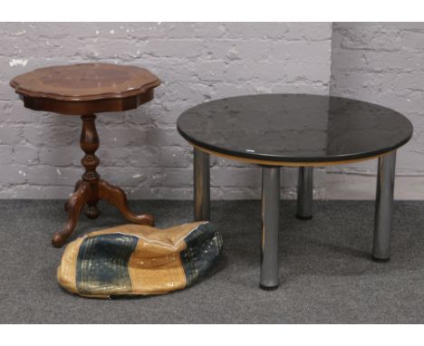 An unstuffed leather pouffe, inlaid mahogany tripod occasional table along with a marble effect and chrome coffee table.