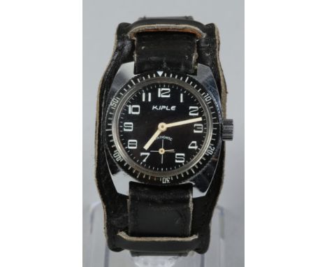 A manual Kiple diving watch with leather strap.