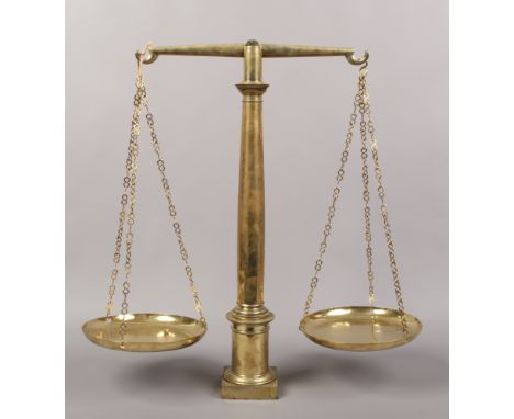 A set of 19th century bronze beam scales.Condition report intended as a guide only.In need of repair.