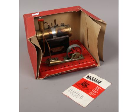 A boxed Mamod model of a steam engine.