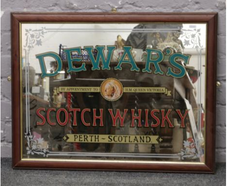 A framed Dewar's Scotch Whisky advertising mirror.