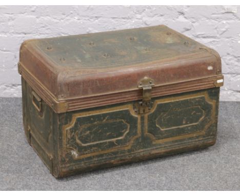 A twin handled tin trunk.