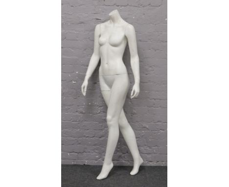 A female shop mannequin.
