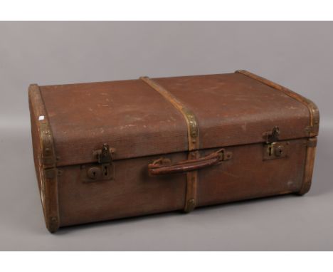 A vintage woodbound steamer trunk.