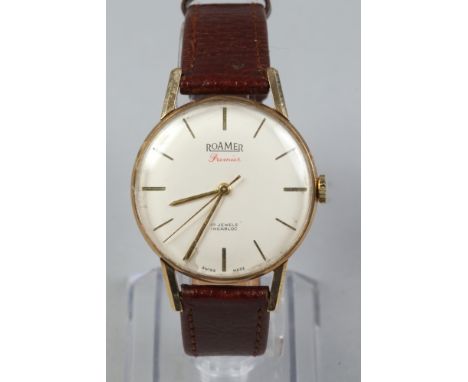 A gentleman's 9ct gold cased Roamer Premier manual wristwatch. With satin dial, baton markers and subsidiary seconds, 32mm..C