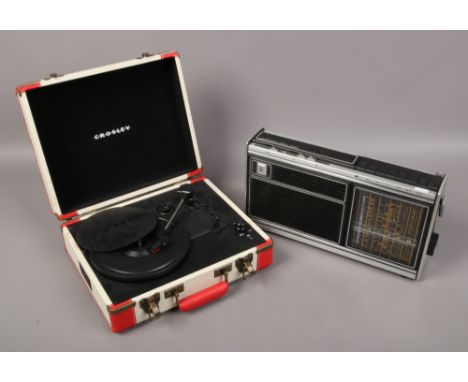 A Grundig concert 1100 portable radio and a Crosley retro style portable record player.