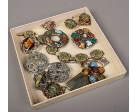 A quantity of Celtic design and polished hardstone jewellery including brooches, bracelet, pendants etc.