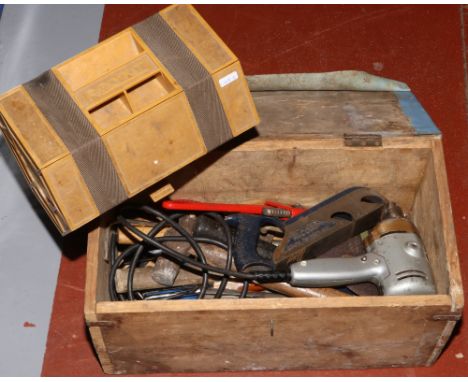 A wooden tool box and contents of vintage tools, Black and Decker drill, hammers, Stilsons etc along with a Rolykit tool box.