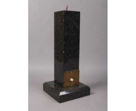 A black granite table lamp base.