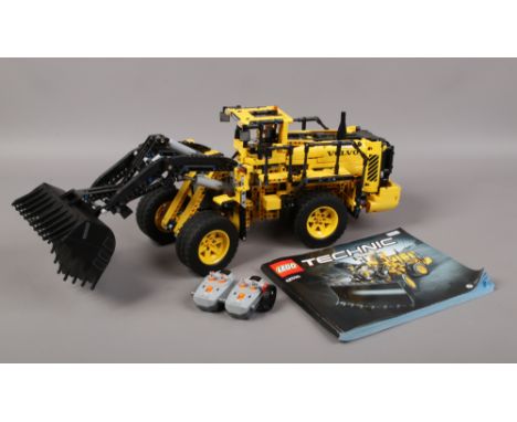 A Lego Technic model of a Volvo L350 4 wheel loader fully built with remote control and full instruction manual.