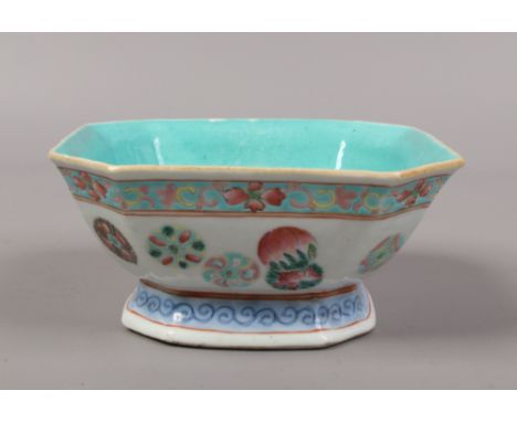 An antique Chinese square cantered bowl decorated in coloured enamels seal mark to the base.