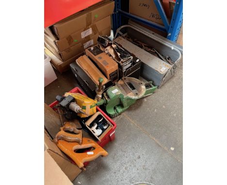 2 boxes and a toolbox of tools and a Record No5 vice. 