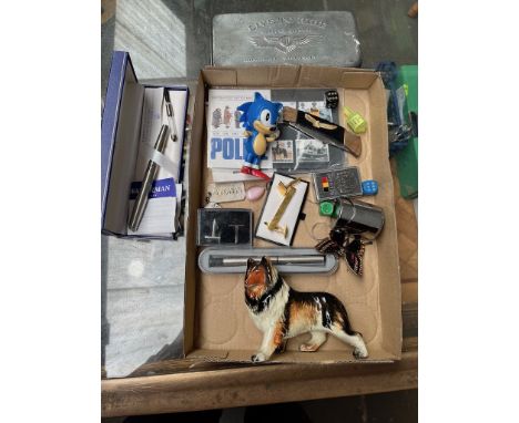 A box of collectables to include penknife, lighter, pens, etc. 
