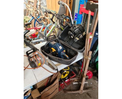A petrol chainsaw, a McCulloch petrol strimmer, a Titan electric chainsaw - AS FOUND and a bundle of garden tools