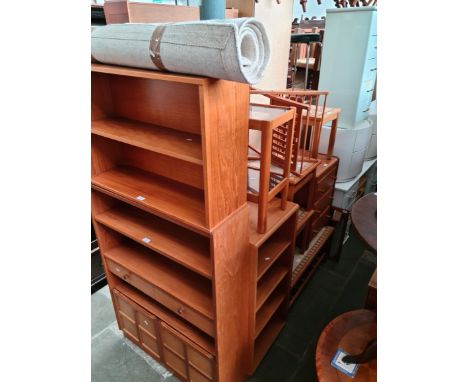 Various items of mid 20th century teak furniture including a Nathan bookcase, two other bookcases, teak and glass side table,