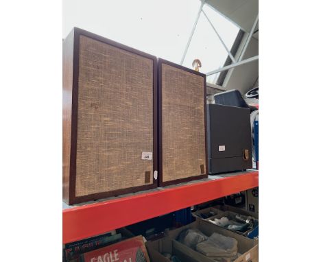 A pair of Acoustic research AR-7 loudspeakers and a Eumig cine projector. 