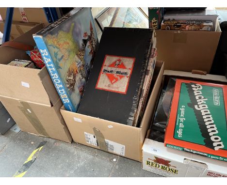 3 boxes of boxed games to include Wasgij? Monopoly, Backgammon, etc and a group of pictures including marquetry scene, etc 