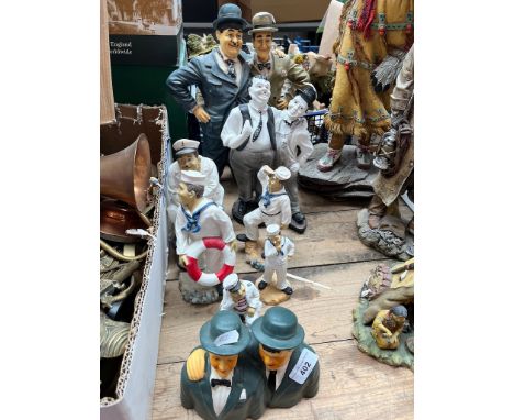 Laurel and Hardy collection of composite figures ( one ceramic ) - 8 figures. 