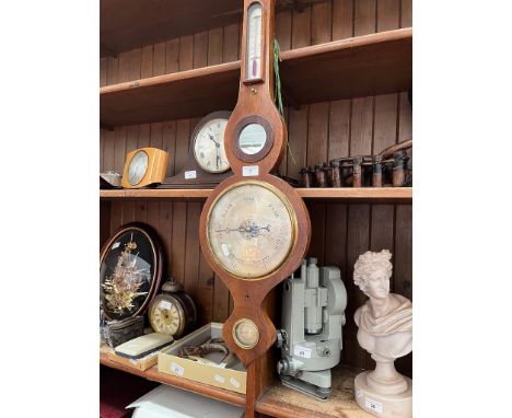 An aneroid barometer. 