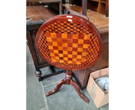 A 19th century mahogany tripod table with chessboard and parquetry inlay to the top. 