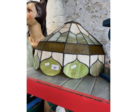 A Tiffany style light shadeCondition:- General wear through age and use, a crack in one panel and some gaps between lead and 
