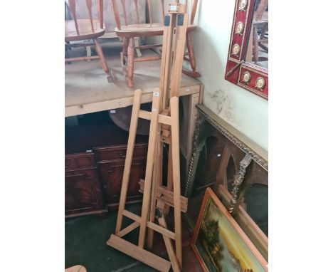 Two large beech easels, one vintage and one modern. 