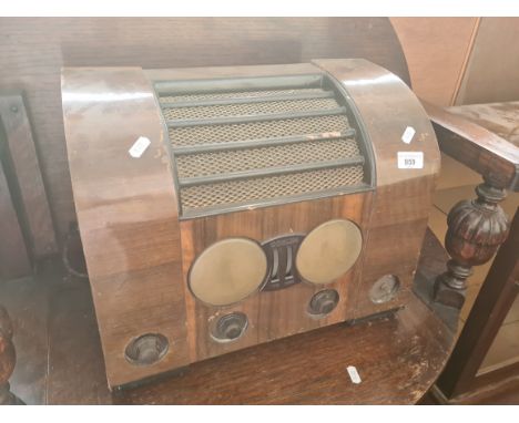 A vintage Goblin walnut cased radio. 