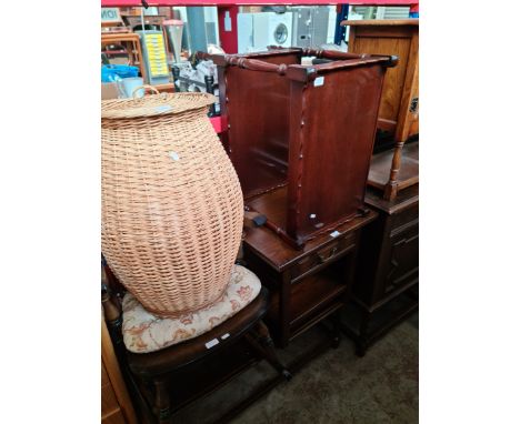 A coffee table, an oak side table, a rocking chair, a mahogany trolley and an ali baba basket. 