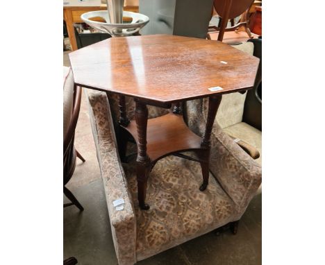 An Edwardian octagonal top table. 