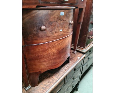 A Georgian mahogany commode. 