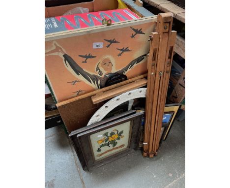 A quantity of advertising pictures, a mirror and artist's easel. 