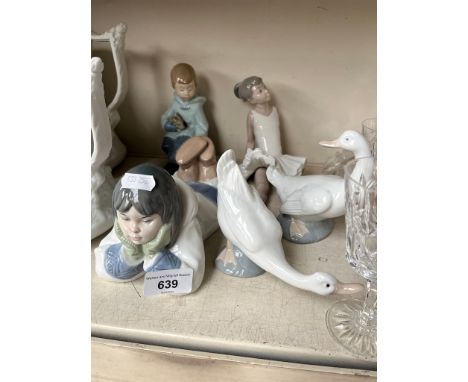 A group of 5 Nao items to include reclining girl and seated ballerina 