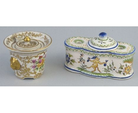 An ink stand, of tapering circular form with flared rim, removable inkwell with lid, pen aperture, painted with panels of flo