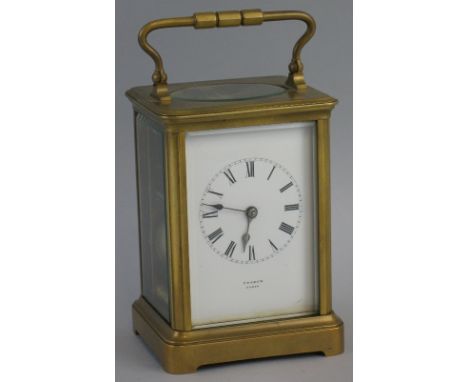 A French carriage clock, of oblong form having white enamelled dial with Roman numerals inscribed "Pearce Paris", enclosing a