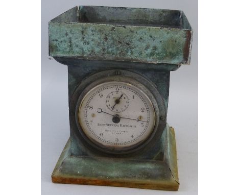 A Negretti & Zambra London Zero-Setting rain gauge, late 19th/early 20th Century with green weathered copper square case, rem