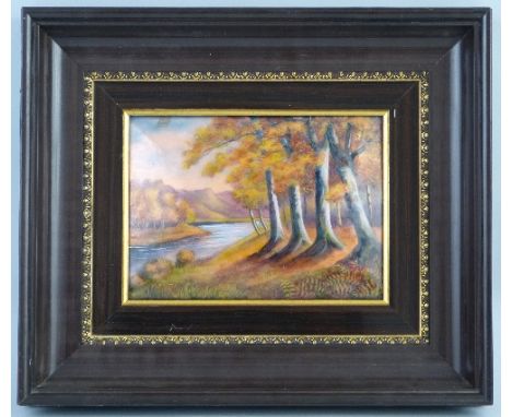 A 20th Century Limoges enamel plaque, depicting a river landscape scene, signed R Bonhomme, 15cm x 21cm, simulated wood grain