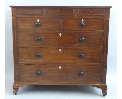 A Victorian mahogany chest, with satinwood inlay, the reeded edged top over three frieze drawers, two short and three long gr