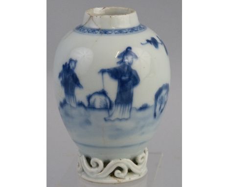 A Chinese tea caddy, probably Kangxi period, of ovoid form with pierced scrolls to the base, painted in blue and white with f