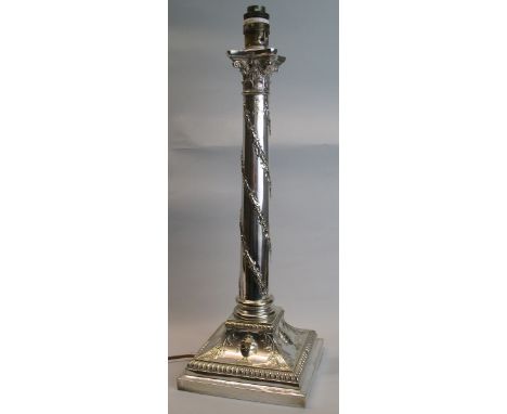An electroplated table lamp, in the form of a Corinthian column moulded with garlands of harebells, the square spreading base
