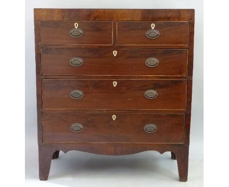 A 19th Century mahogany chest, of two short and three long graduated drawers with ivory escutcheons and brass loop handles, o