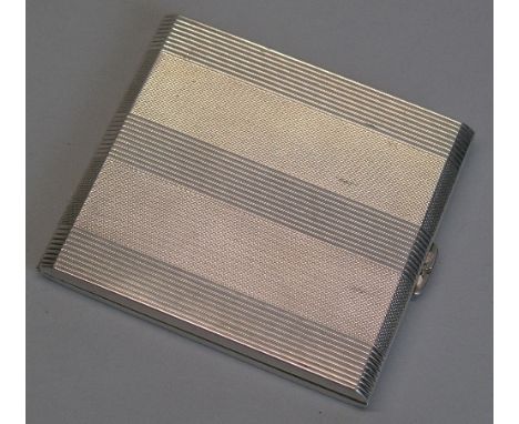 A continental white metal cigarette case, of hinged oblong form engine turned with banding, 9cm wide, stamped 900, 3.02ozs