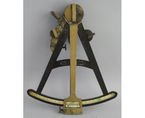 A 19th Century ebony and brass vernier octant, the A-shaped frame inset with an ivory scale and mounted with a brass framed m